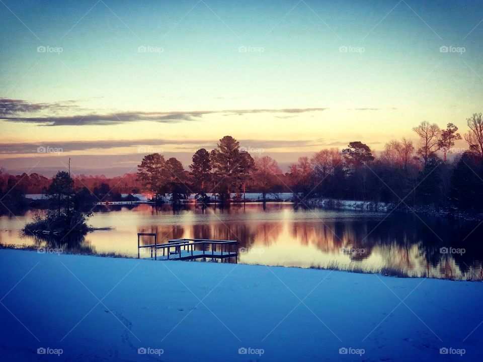 Snow blanketed sunset 