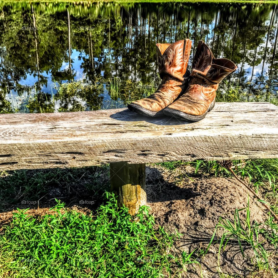Lakeside Bench and Cowboy Boots