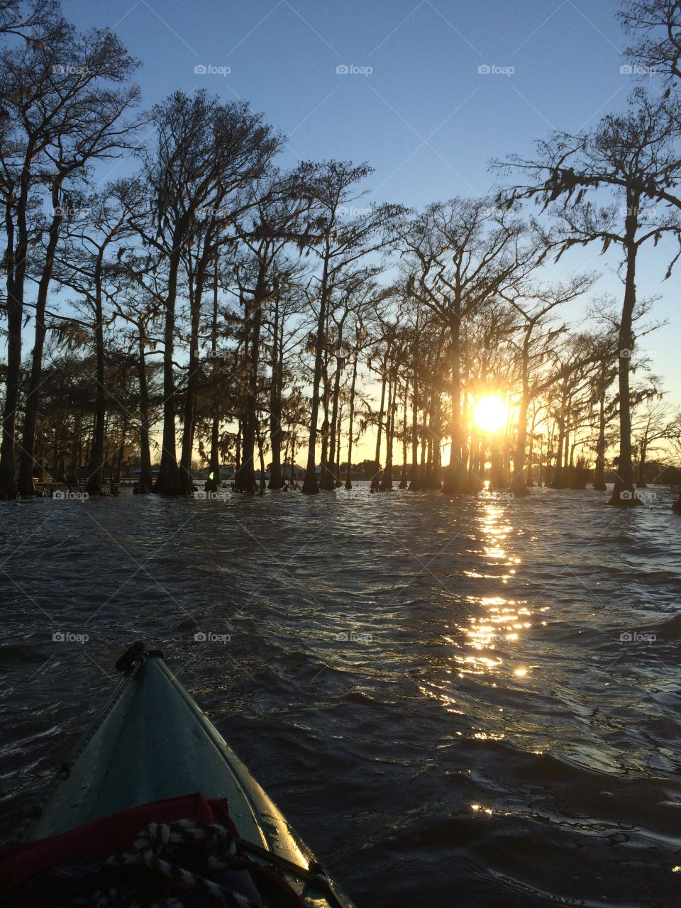 Kayak lake sunset