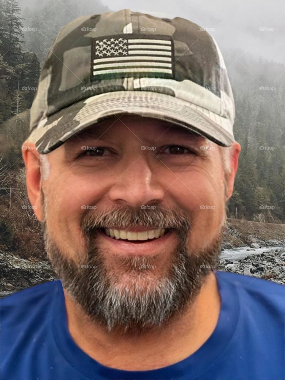 Man outside with full beard.