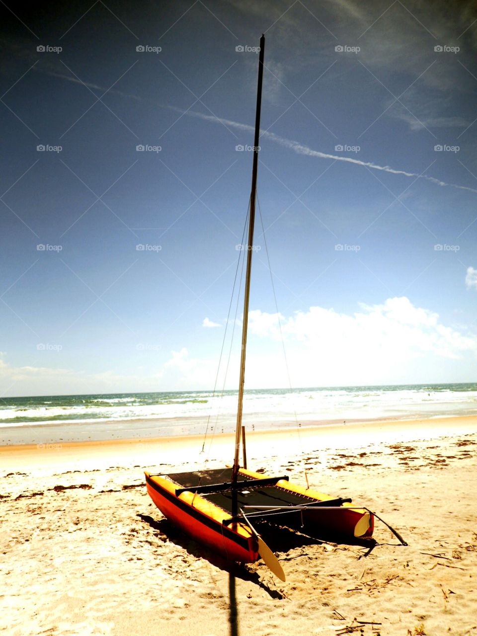 beached. sailboat on daytona beach