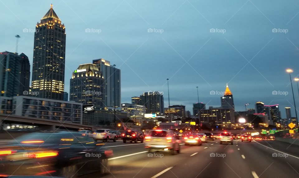 Traffic through the city at dusk makes for a sight