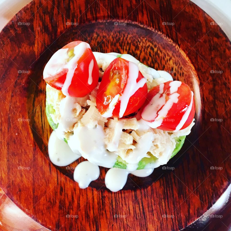 Avocado with tomato tuna and blue cheese dressing 