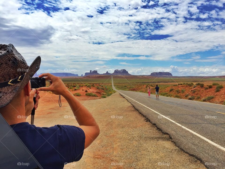 taking a photo of the monument valley