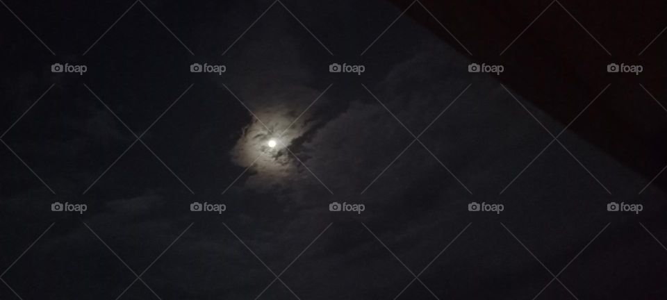 Beautiful full moon night with beautiful clouds.