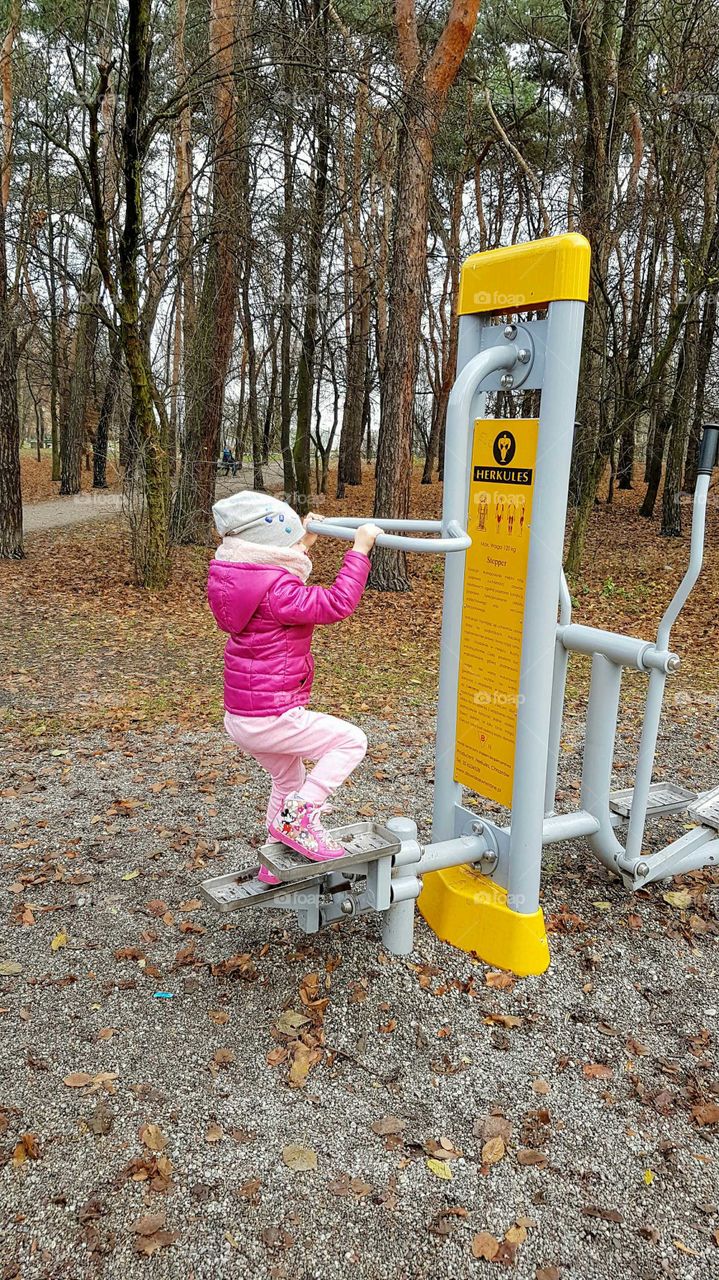 Julia playing in a park