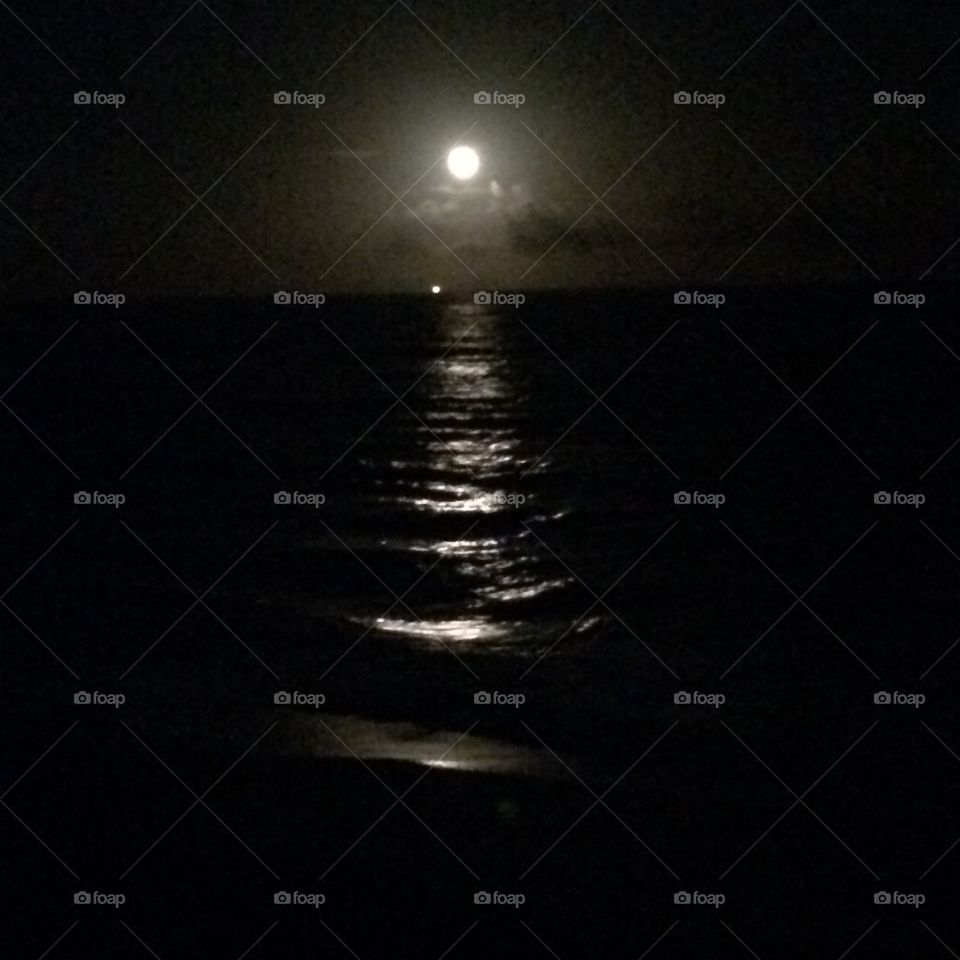 Full moon over ocean