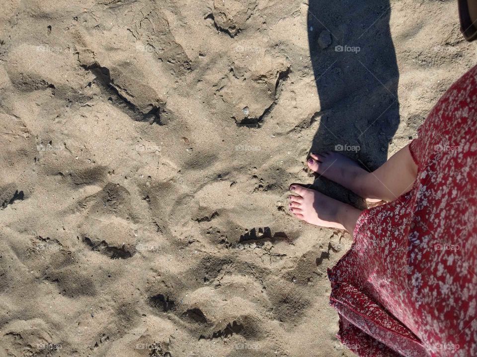 feet in the sand