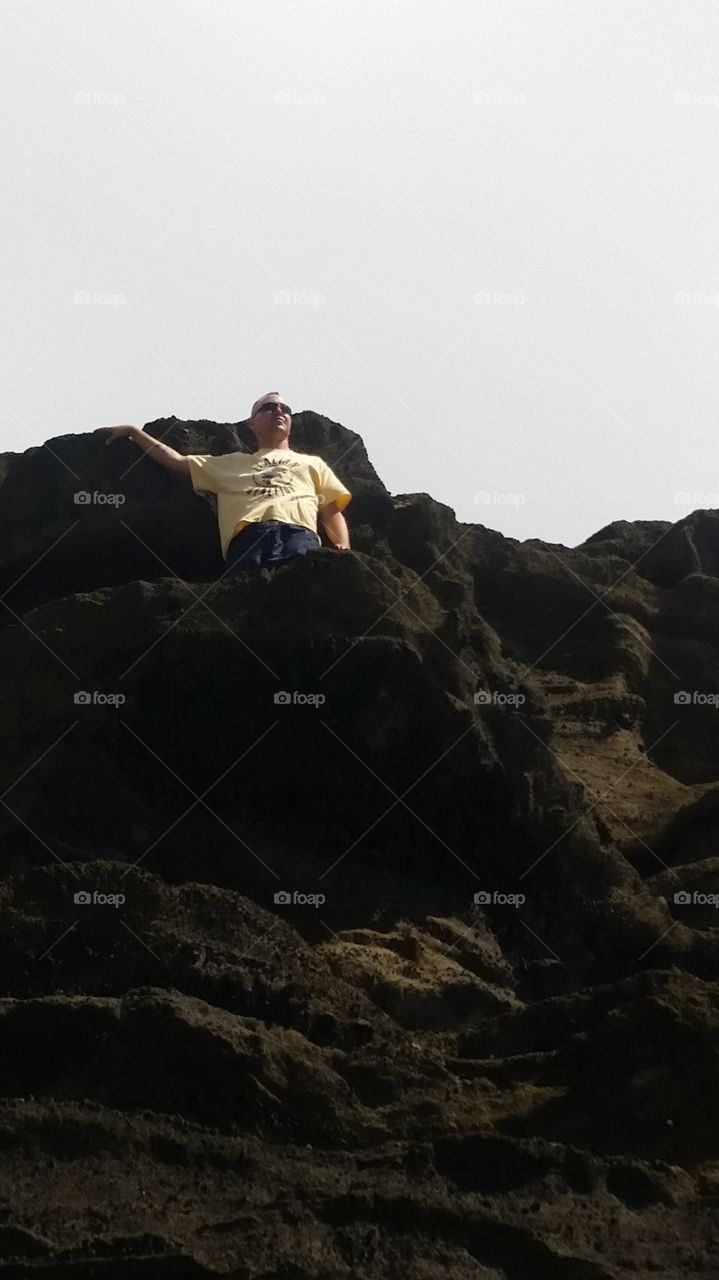 Low angle view of man on the mountain