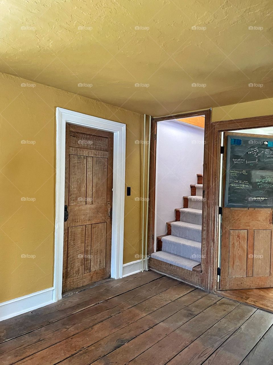 India Yellow interior in a revolutionary era farmhouse 