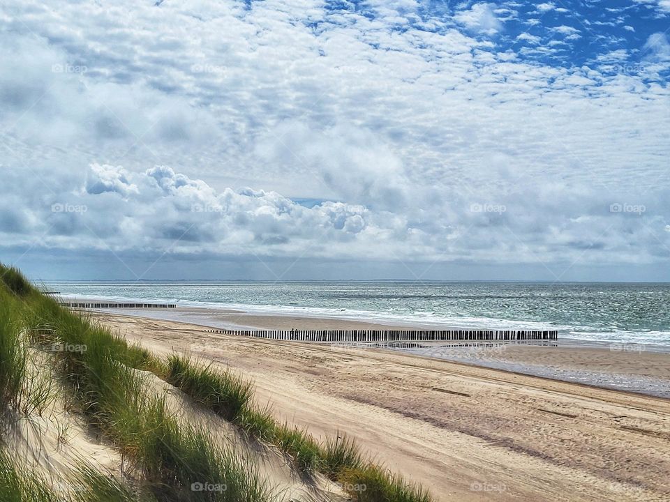 The beach of Burgh Haamstede is the most beautiful beach in the Netherlands. You have to walk at least half a hour through the amazing dunes to be here.