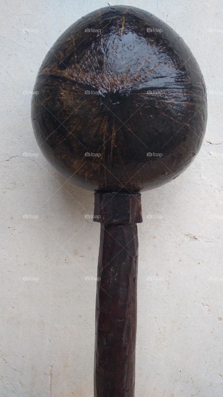 The ancient dipper is made of coconut skin and wood