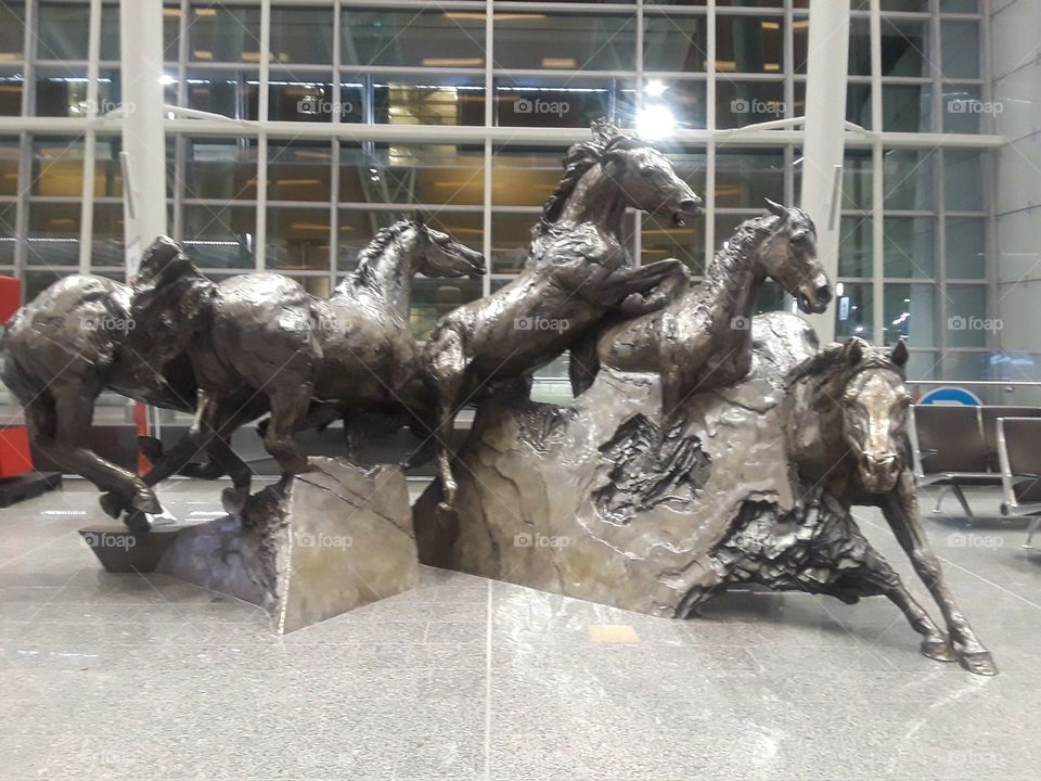 YYC airport horse statue
