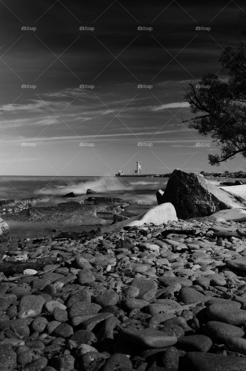 sitting by the lake on a gloomy day