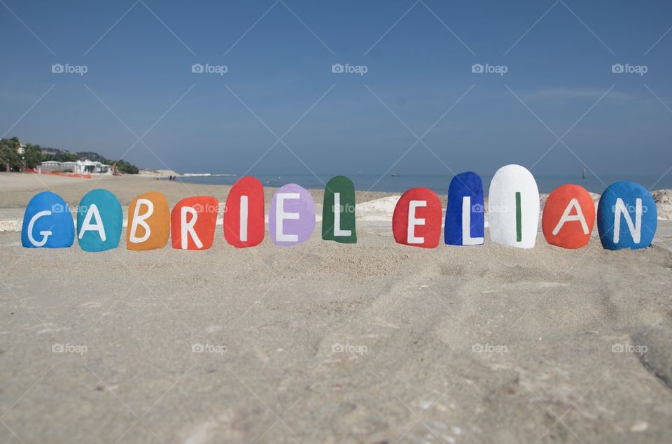 Gabriel Elian, name on colourful stones