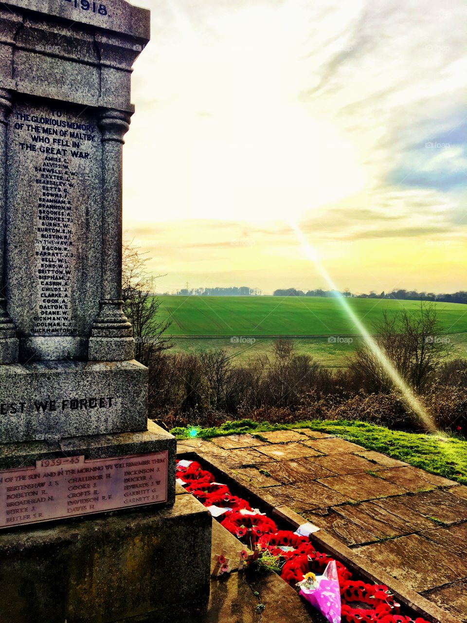 Cenotaph War memorial with countryside landscape