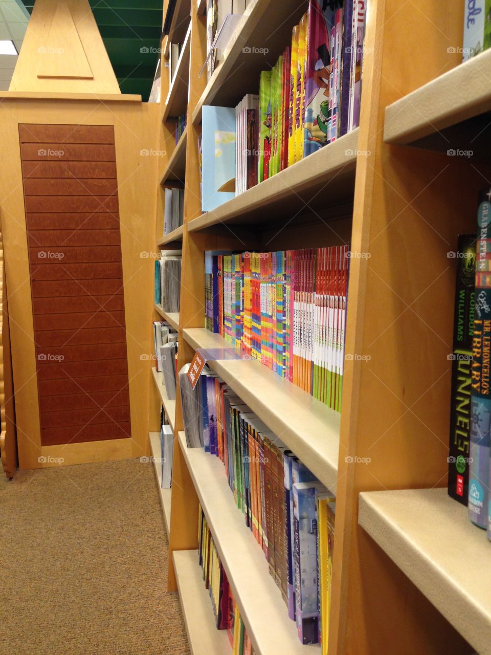 Bookstore shelves. The shelves with books in the children's section of a local bookstore.