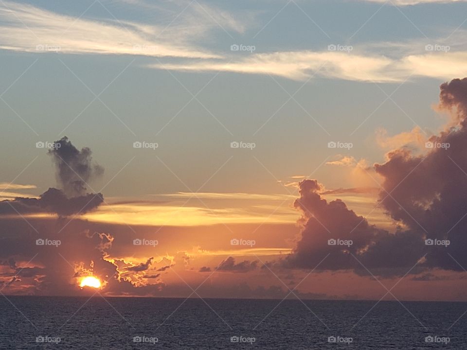 clouds and sunset over the ocean