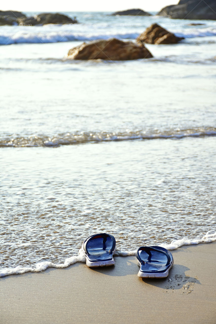 slippers in the beach