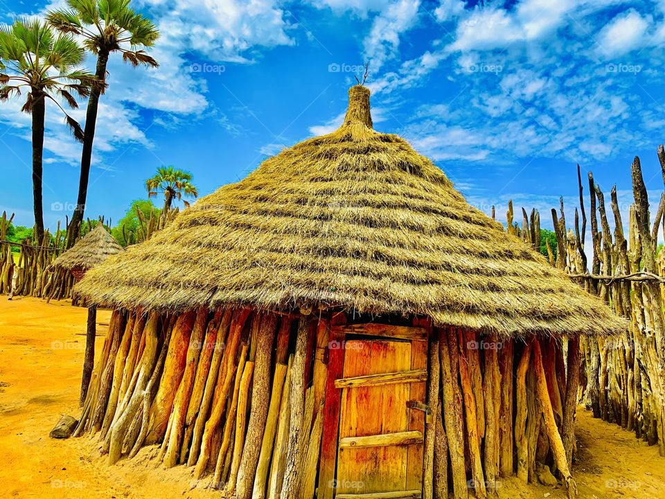 This beautiful hut is my mother’s storeroom at the farm. Made of timber and dry grass thatched roof. It looks so beautiful on a sunny day with a bright blue cloudy sky.