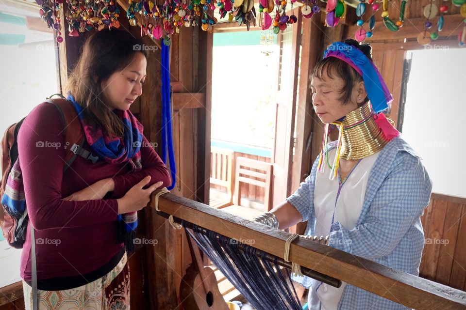 Observing silk weaving 