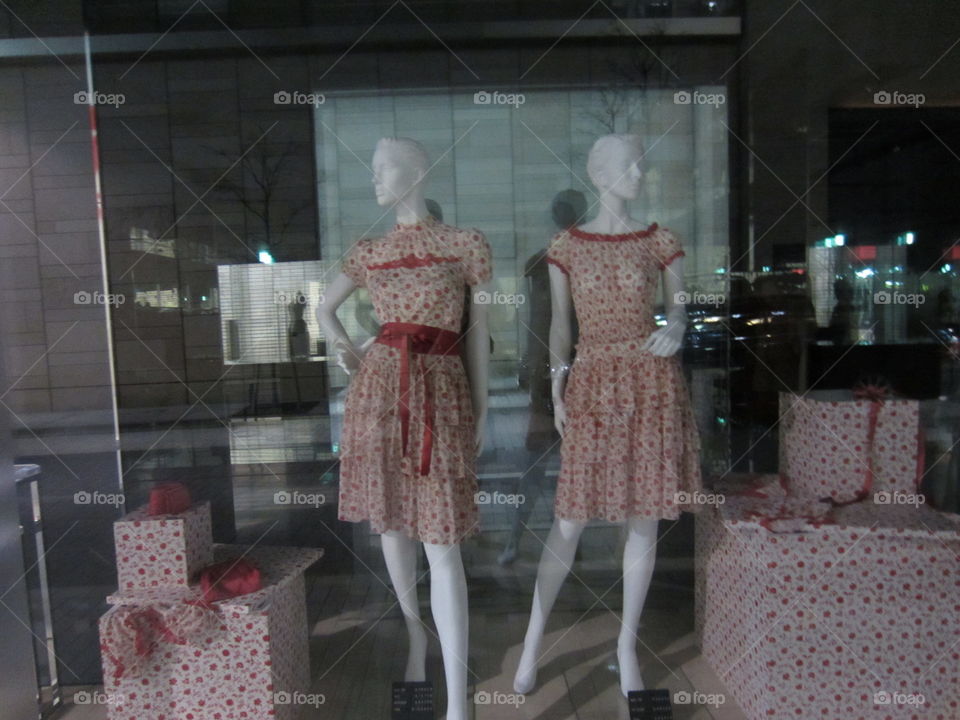 Red and White Spring Dresses on Mannequins, Window Display in Tokyo, Japan. Women's Fashion. Designer Trends.