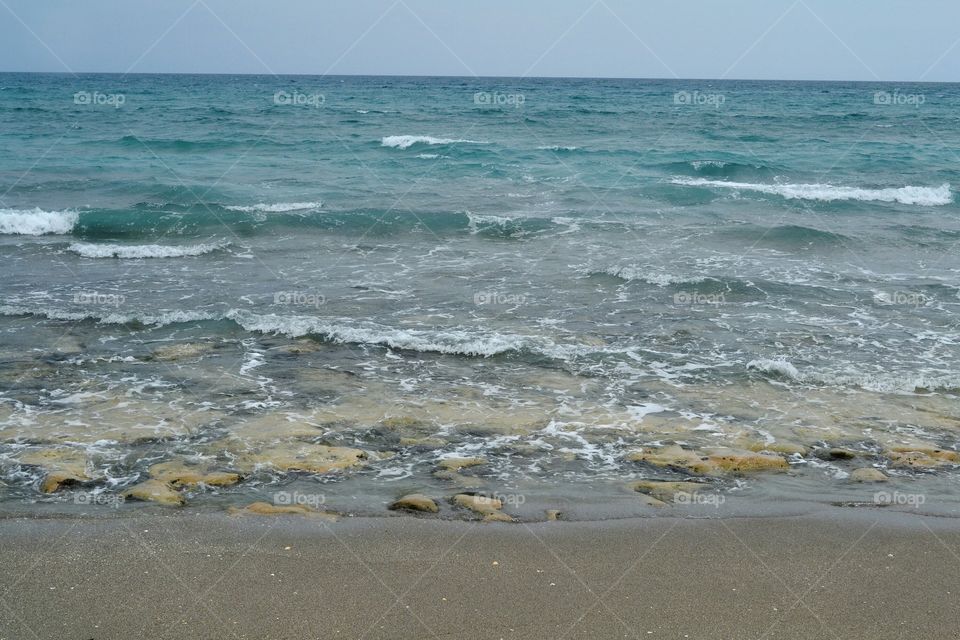 waves. waves over the coquina shoreline of Blowing  Rocks Jupiter, Florida