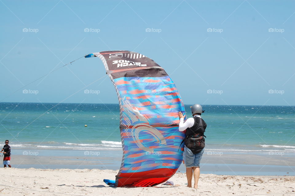 Woman during kitesurfing lesson 