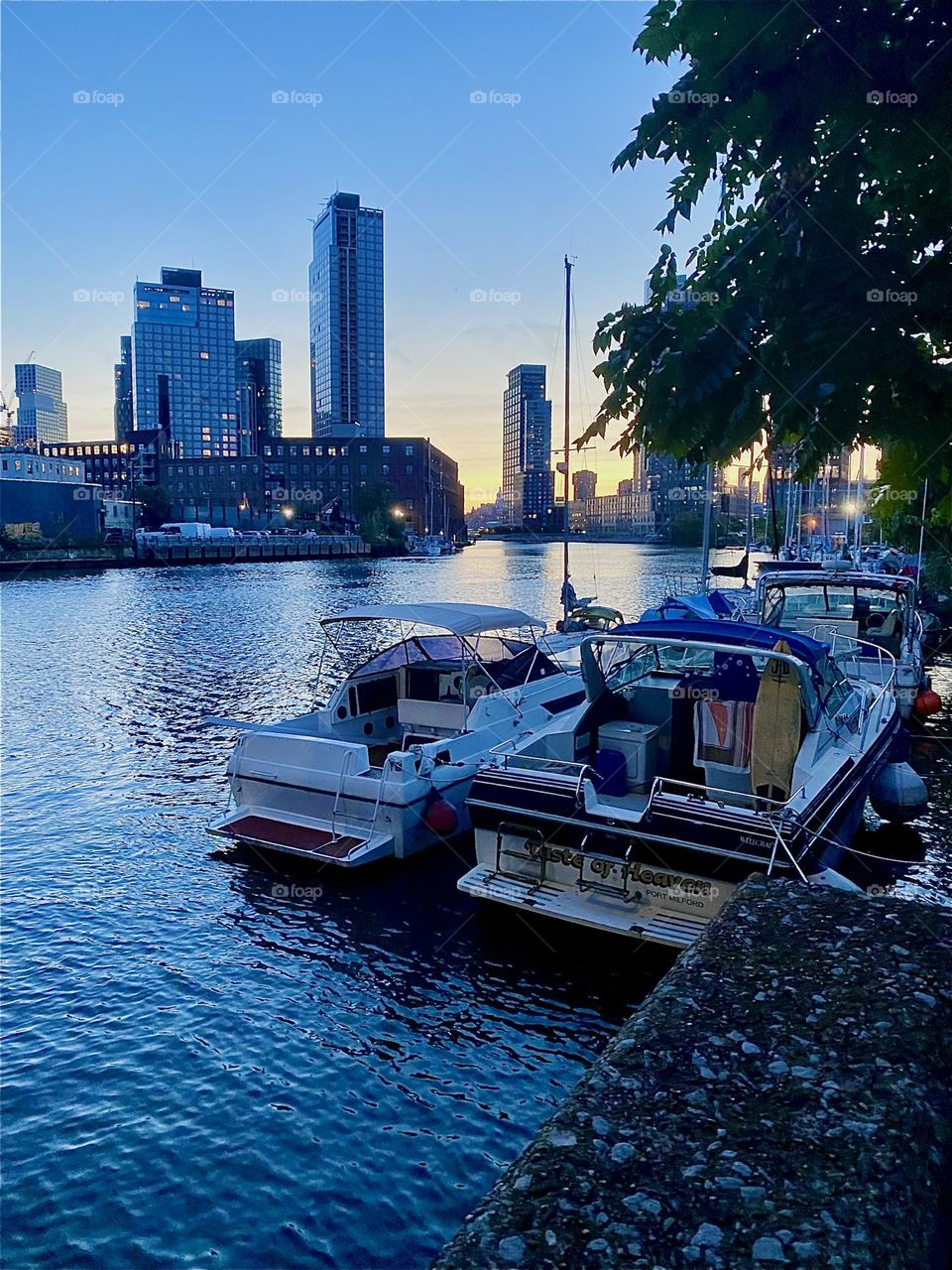 This is “Newtown Creek” at twilight time seen from the parking lot beneath the “Pulaski Bridge” in LIC, Queens on a warm Indian summer evening in early October 2023. Hypnotic Productions