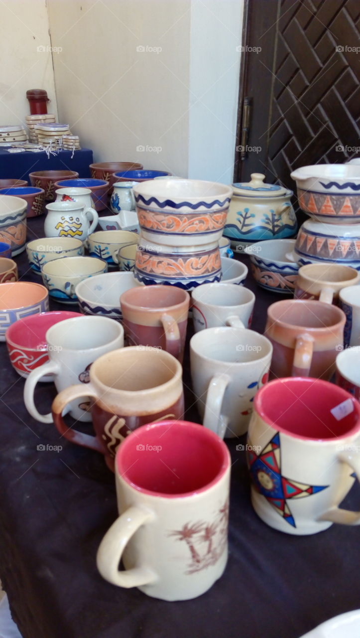 Pottery cups being sold in the market