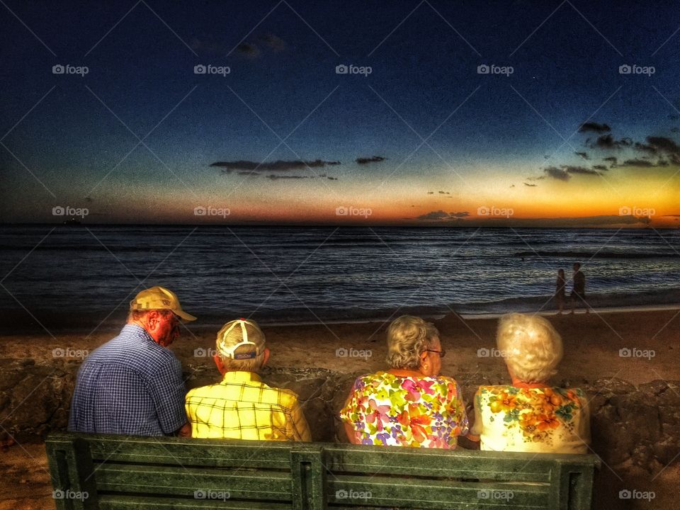 Watching the sunset on vacation in Hawaii