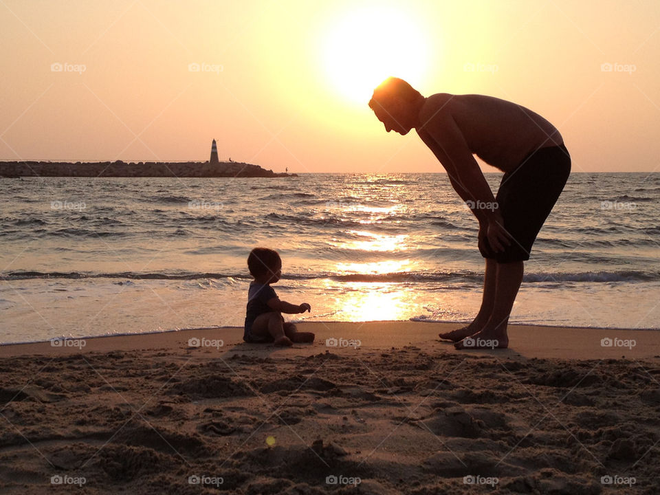 Man and child at the beach