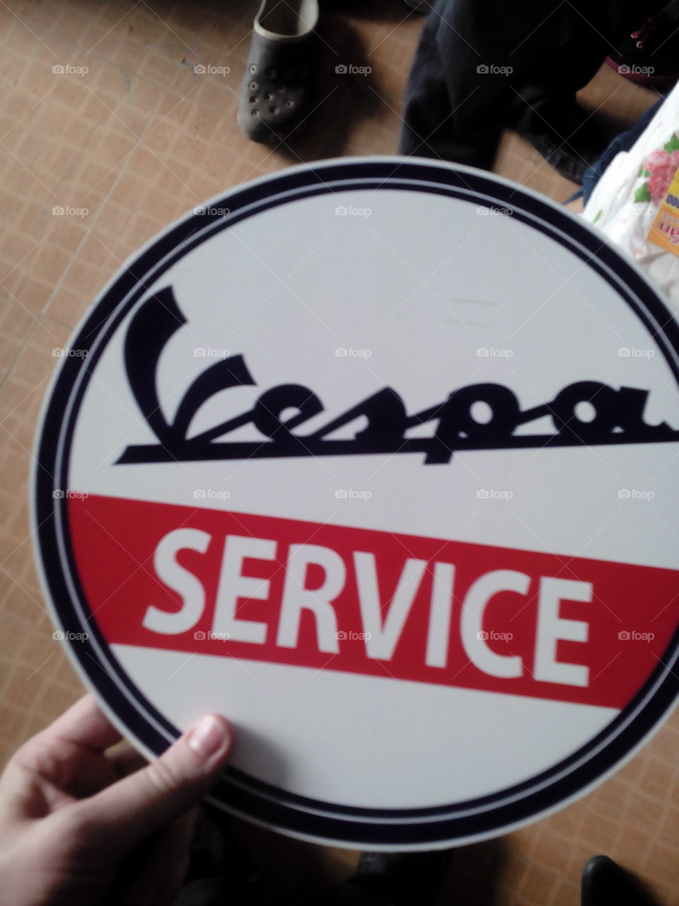 Vespa service. signage