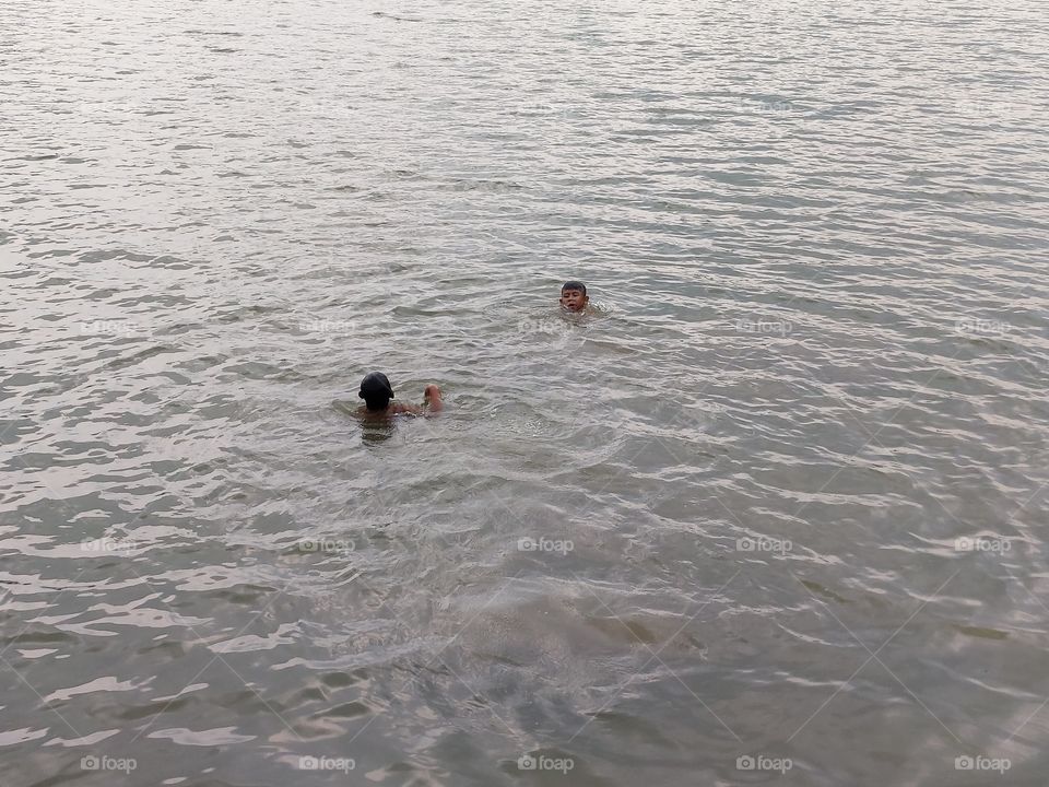 swim and play in the lake