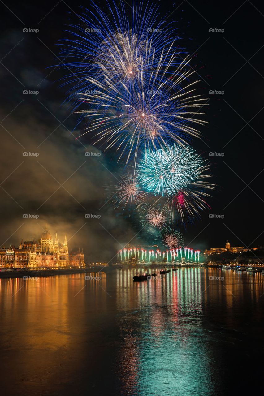 photo of fireworks above body of water