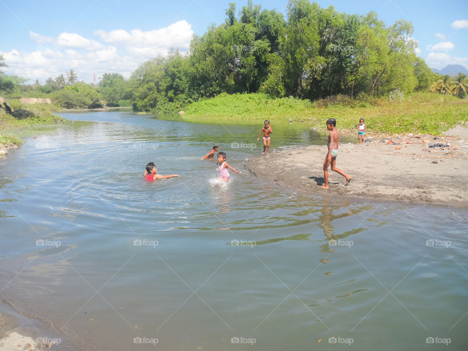 kids in the river