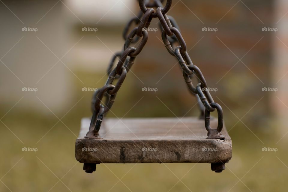 Close-up of empty swing