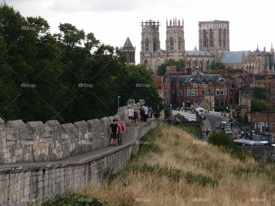 View of the famous York Minster with lots of people on summer vacation 