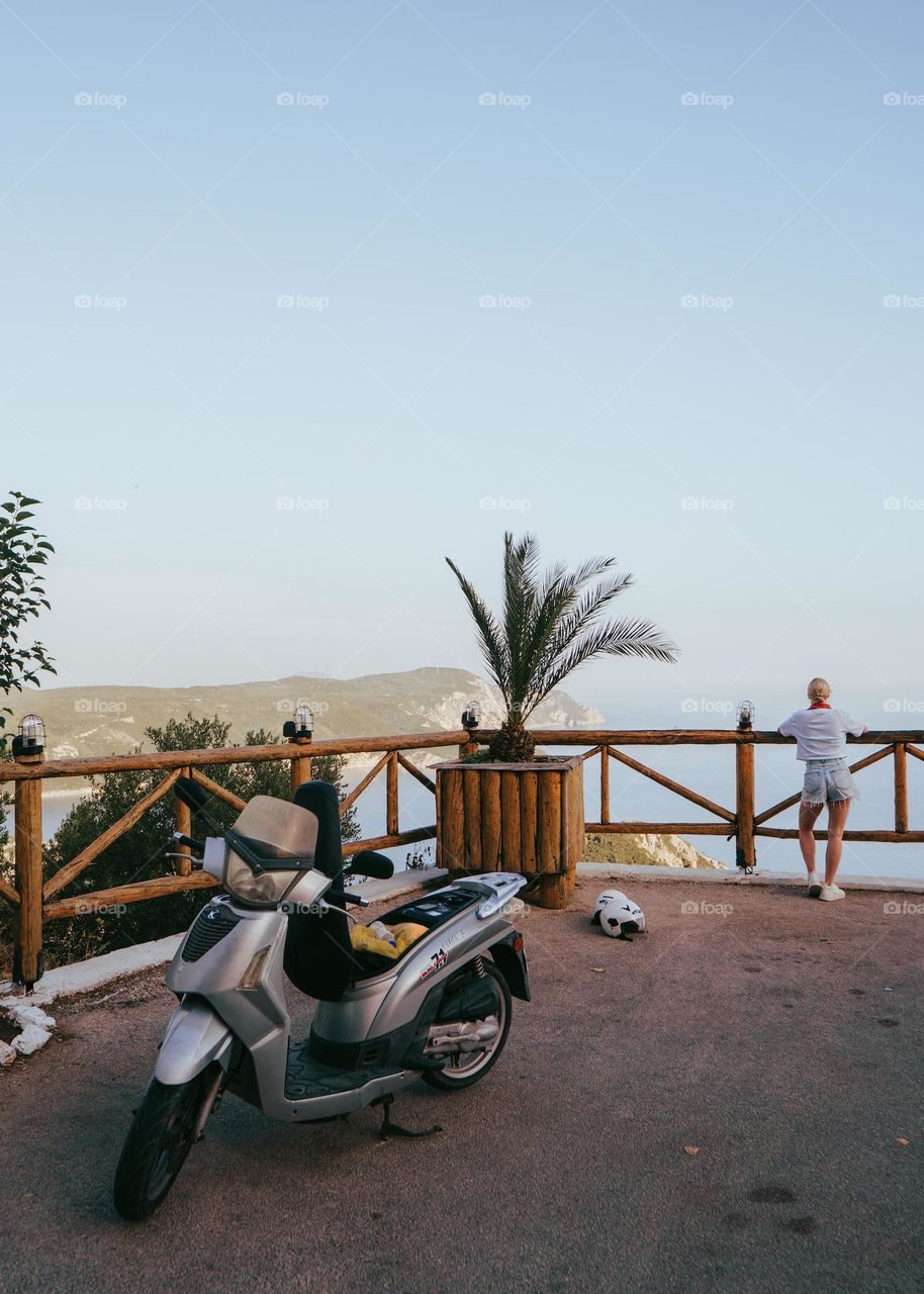 a woman contemplates nature