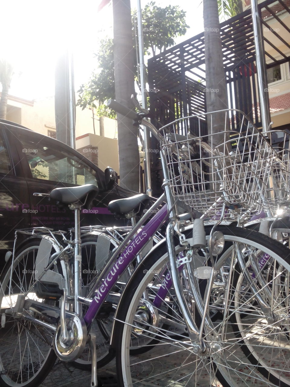 Take me for a ride. bicycle line up in front of Mercure Hoi An Royal Hotel in Vietam