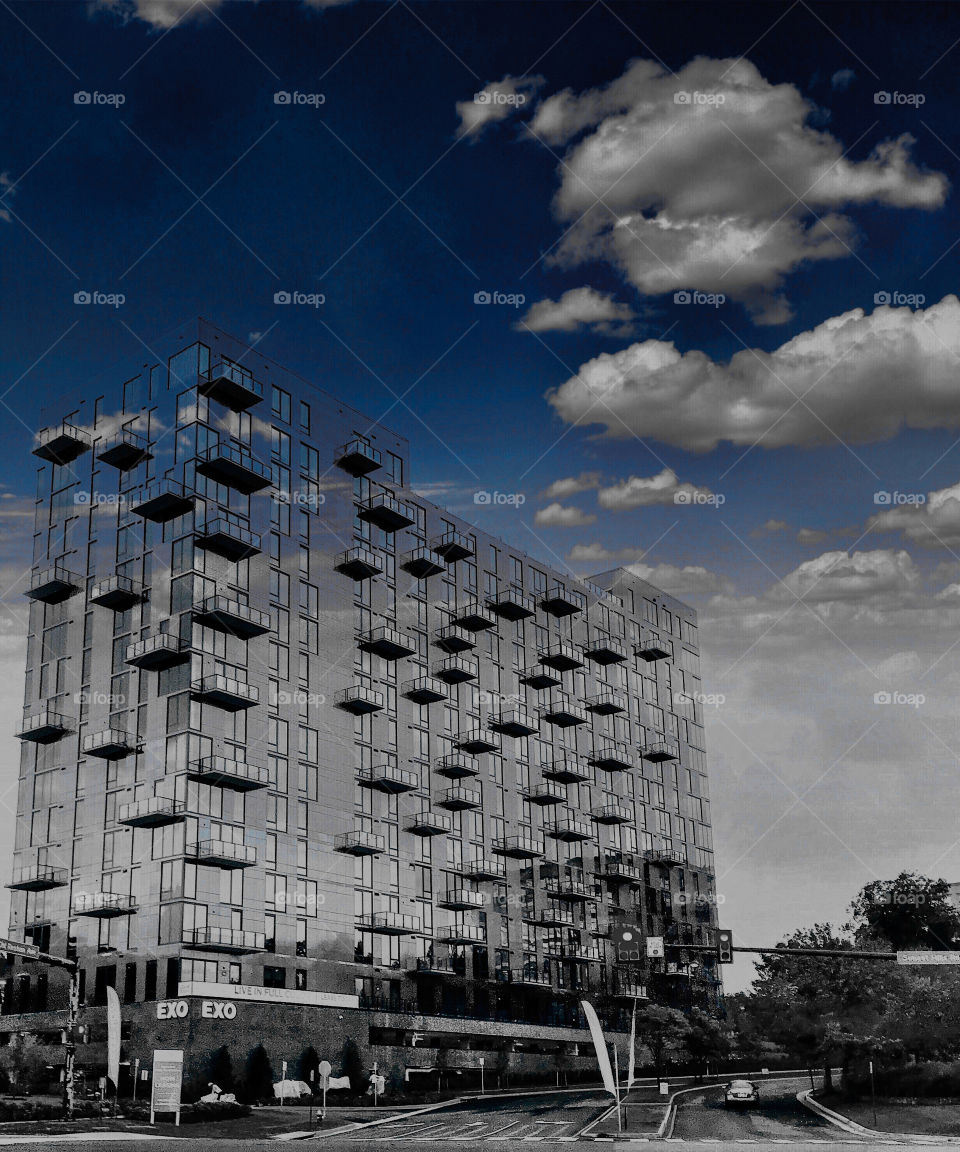 Blue skies over transparent building 