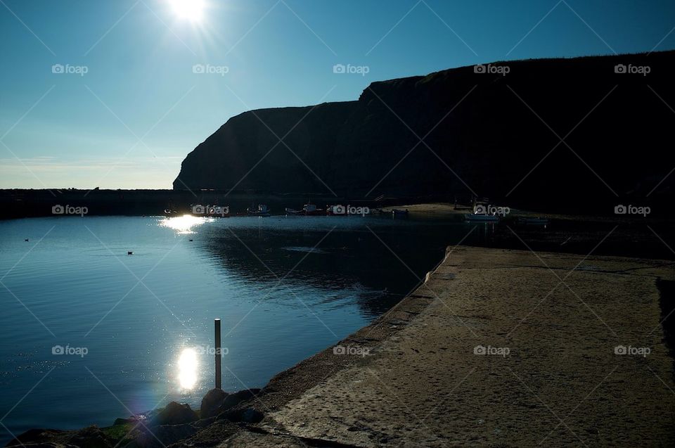 A harbour at sunrise