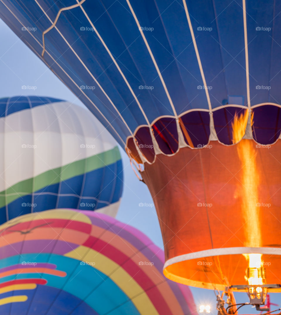 Colorful hot air balloon close up with fire 