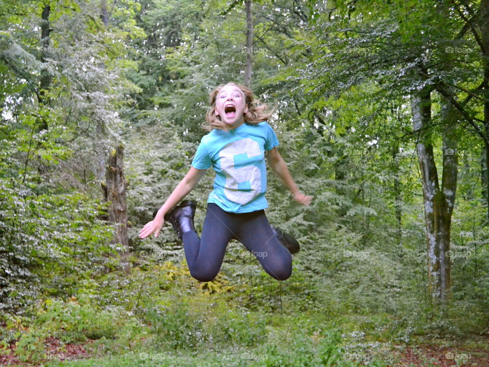 Girl jumping of joy