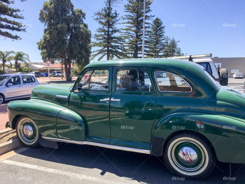 Old Chrysler Cadillac, green, right hand drive 