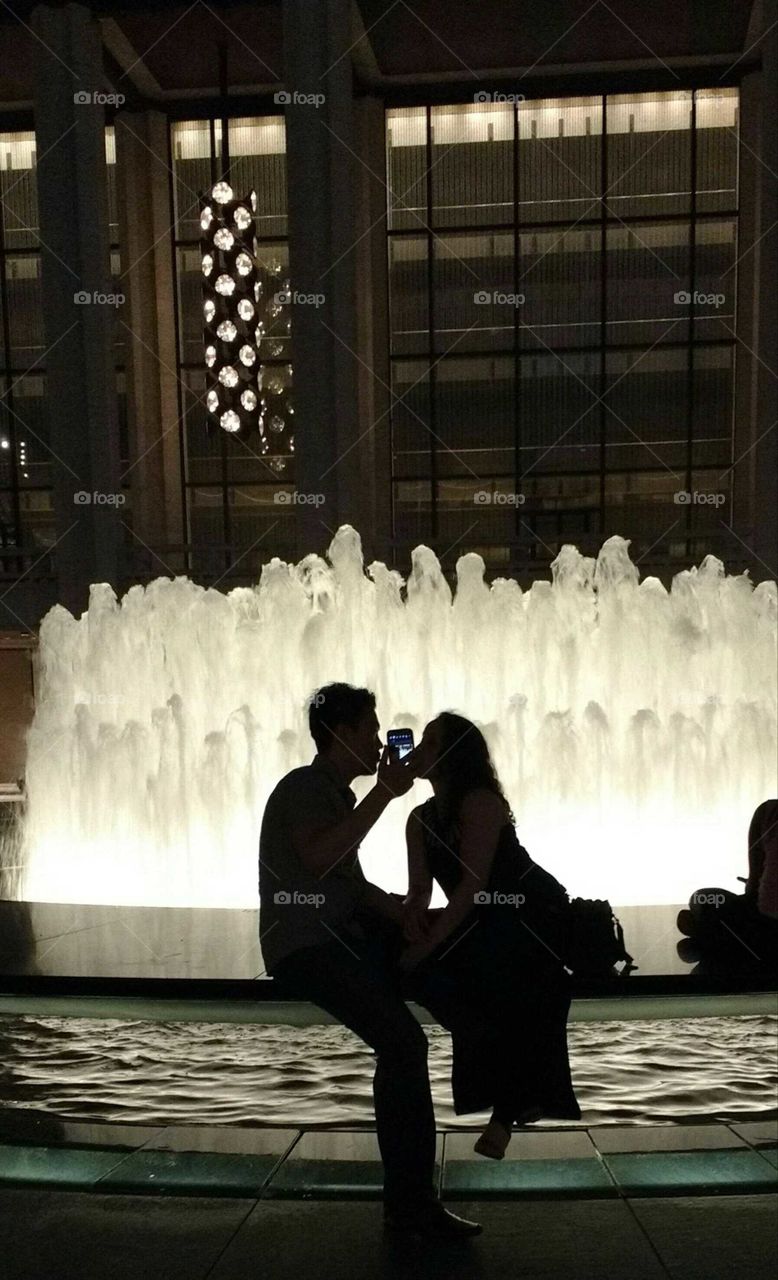 Couple at Fountain at Night NYC