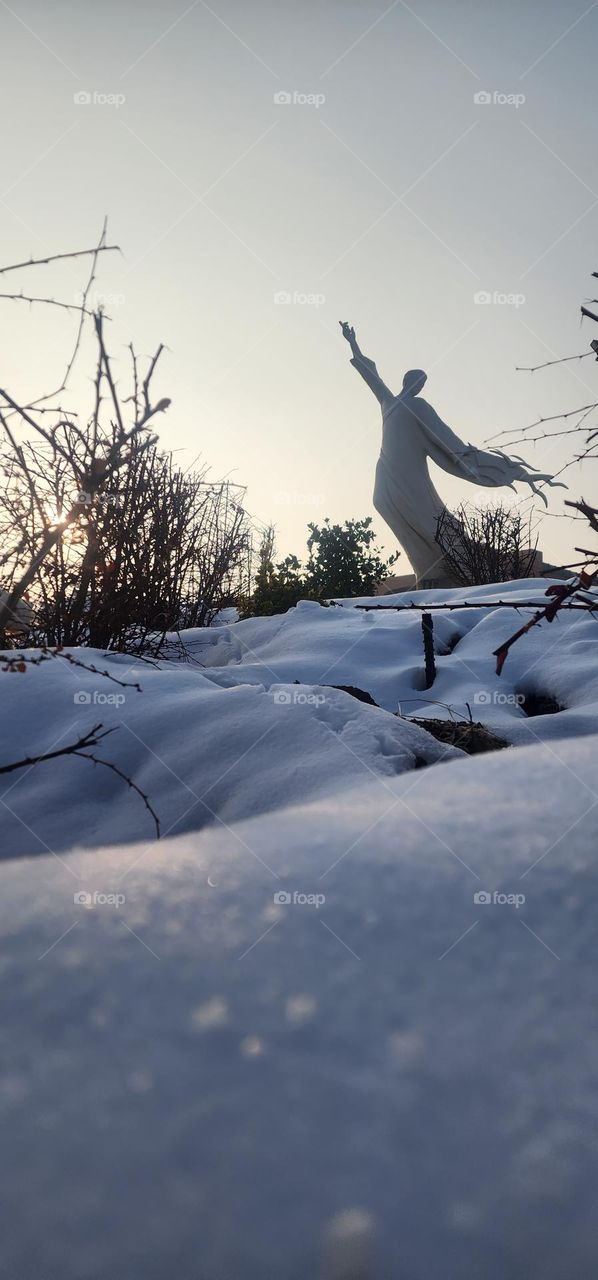 statue in the snow