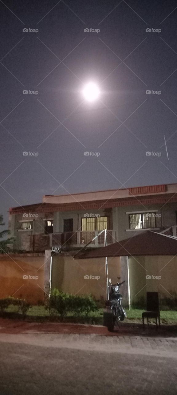 Twinkling windows , the beauty of evening light. Bask in the beauty of evening light with the view of light twinkling from these windows at night