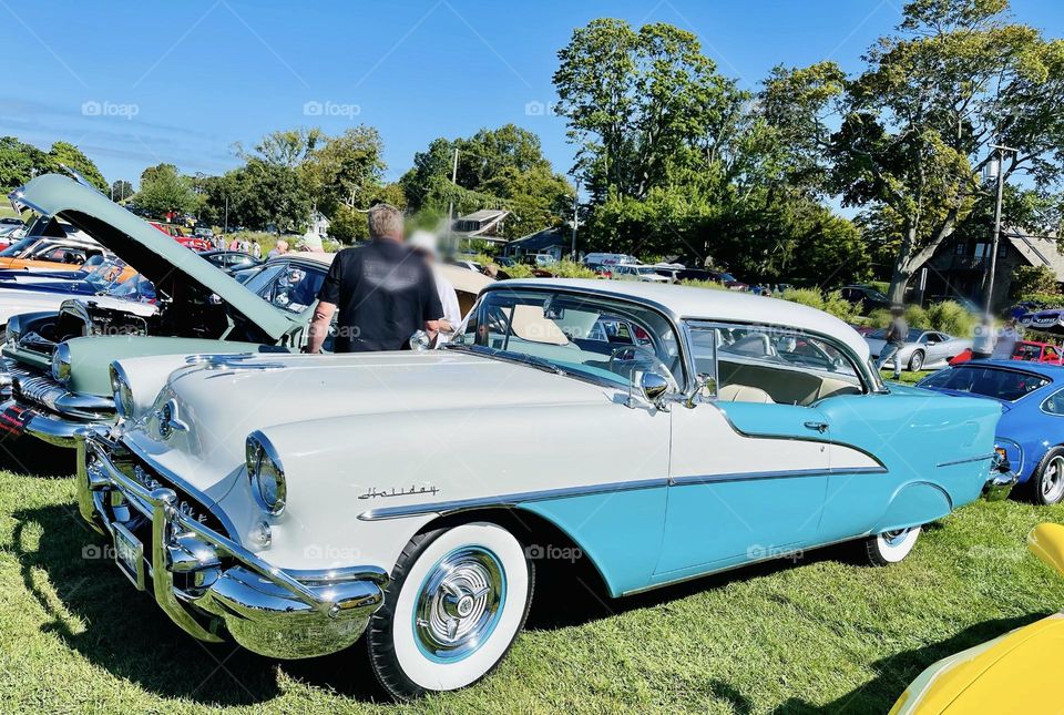 An American classic-1955 Oldsmobile 88 Holiday Coupe. Magnificent Arctic white over twilight blue. 