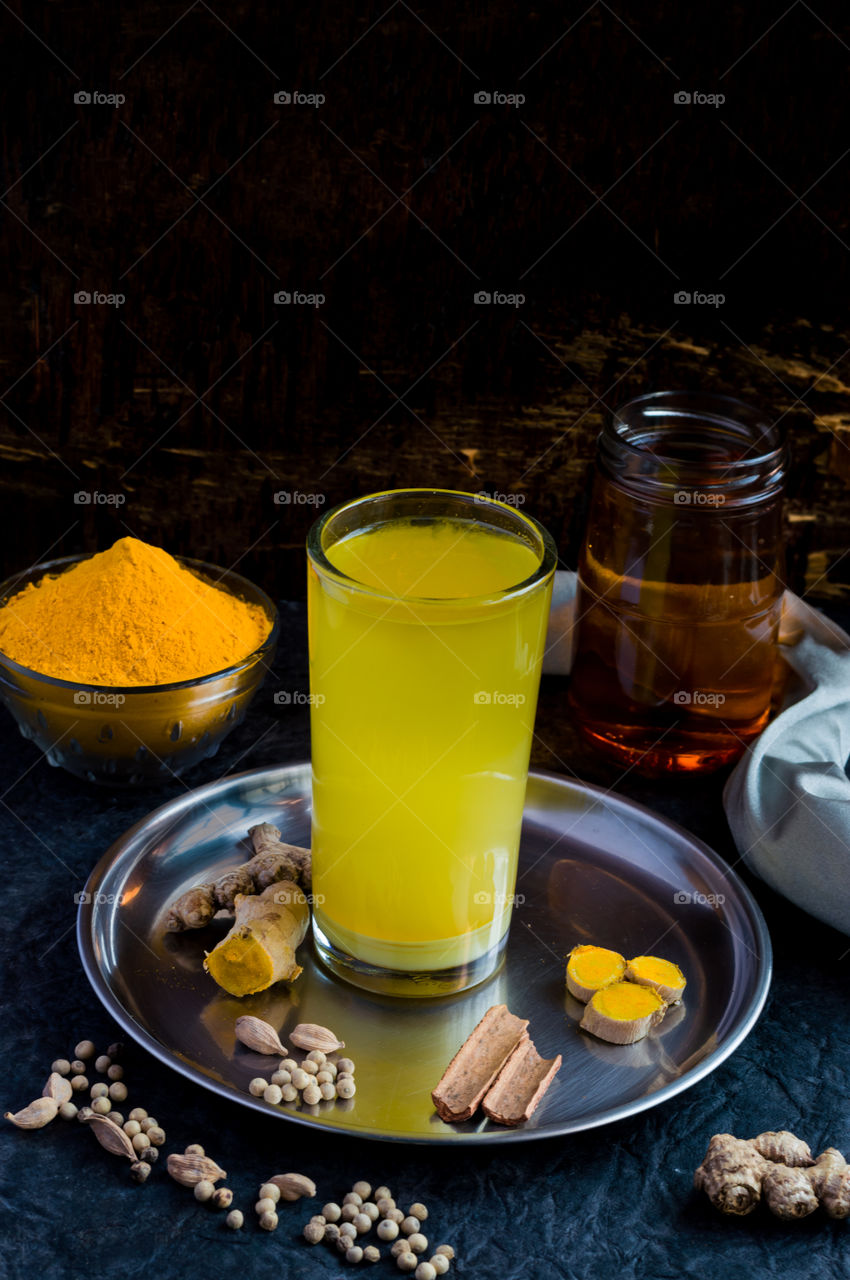 Healthy and tasty turmeric drink with honey, which boosts immunity and helps to stay fit during COVID.